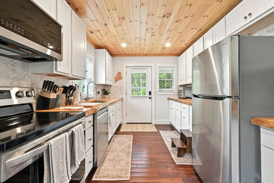 The kitchen showing the different appliances.