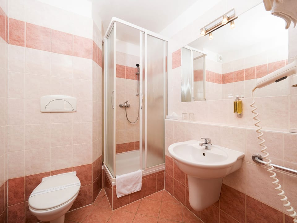 Shower, free toiletries, hair dryer, towels