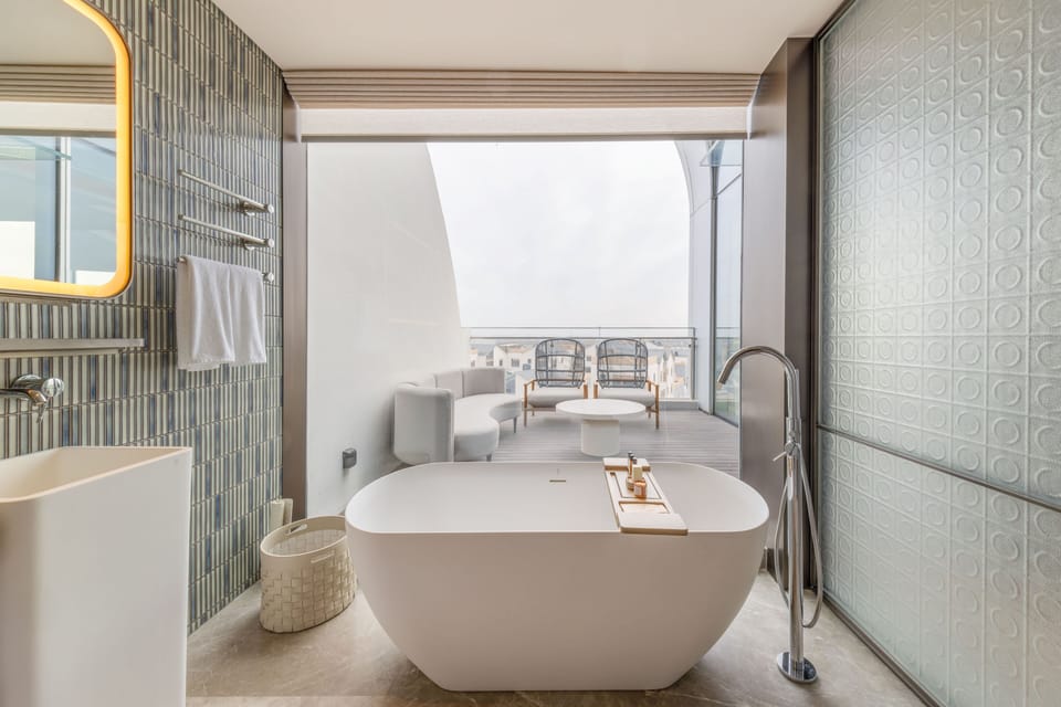 Standard Suite, City View | Bathroom | Hair dryer, bathrobes, slippers, towels