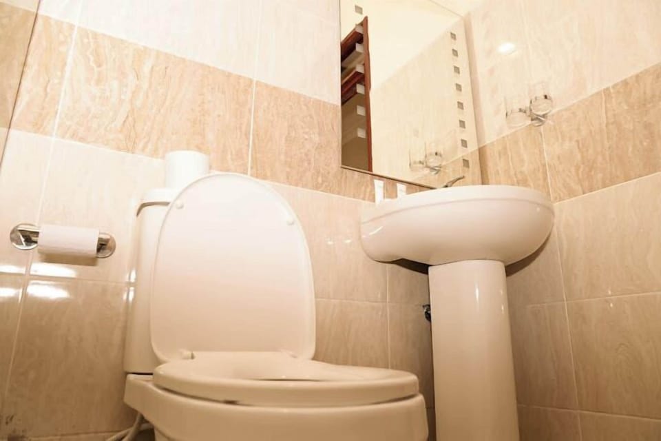 Shower, slippers, towels, soap
