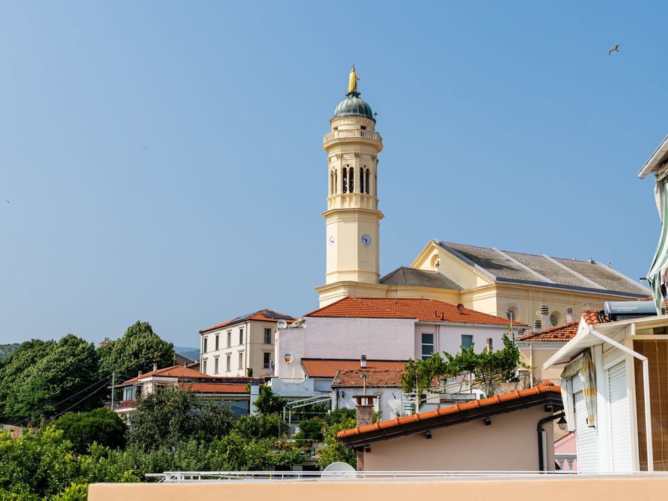 Furniture, Chair, Outdoor Furniture, Table, Outdoor Table, Kitchen & Dining Room Table, Umbrella, Shade, Restaurant, Patio