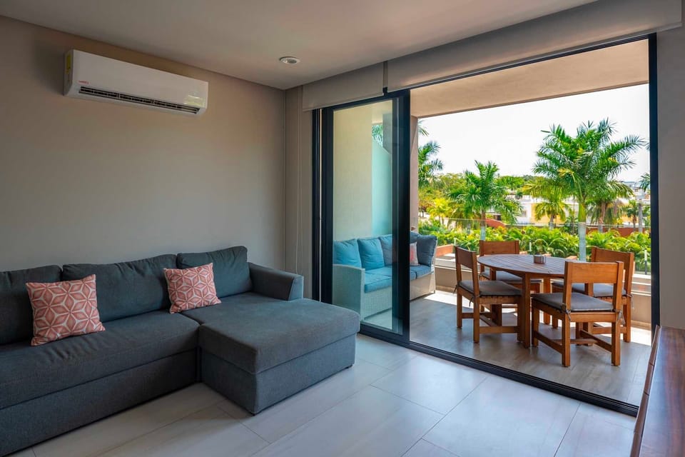 Living Room / Balcony View / Queen Sofa Bed