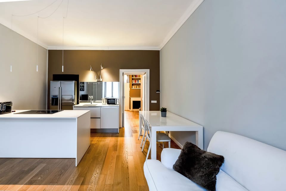 Deluxe Apartment | Living area | TV