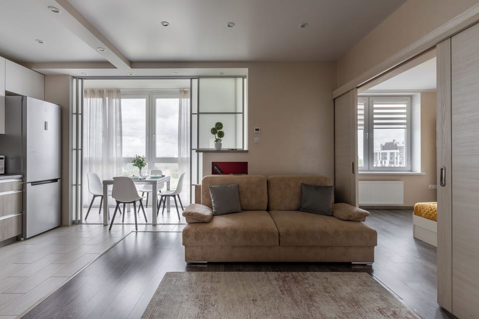 Apartment, Air conditioning, City View | Living area | 50-inch TV with cable channels
