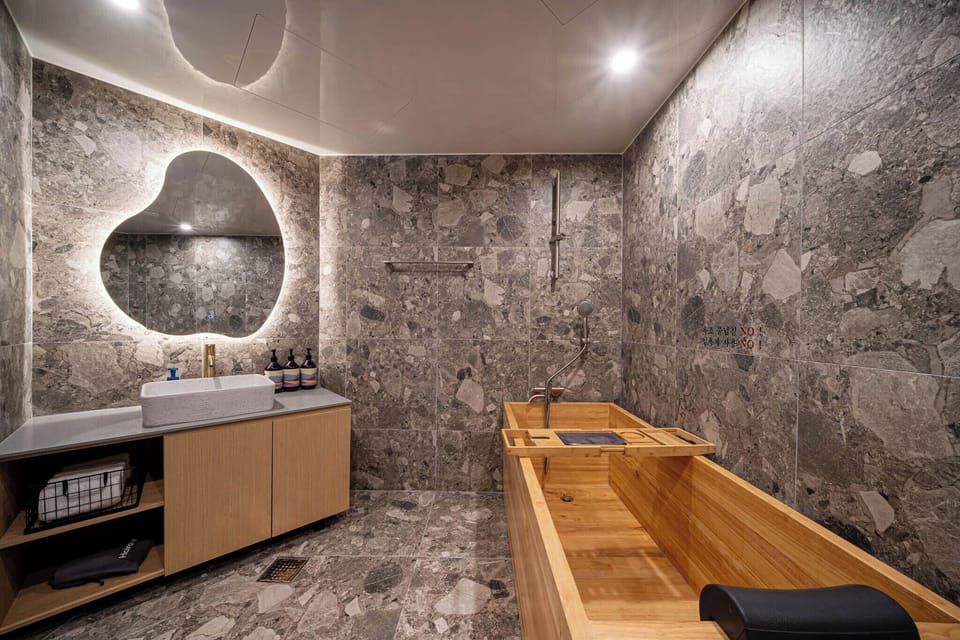 Hinoki Terrace Ocean Room | Bathroom | Hair dryer, bathrobes, towels, soap