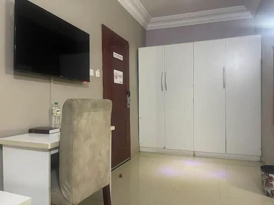 Economy Room, Balcony, City View | Desk, laptop workspace, blackout drapes, soundproofing