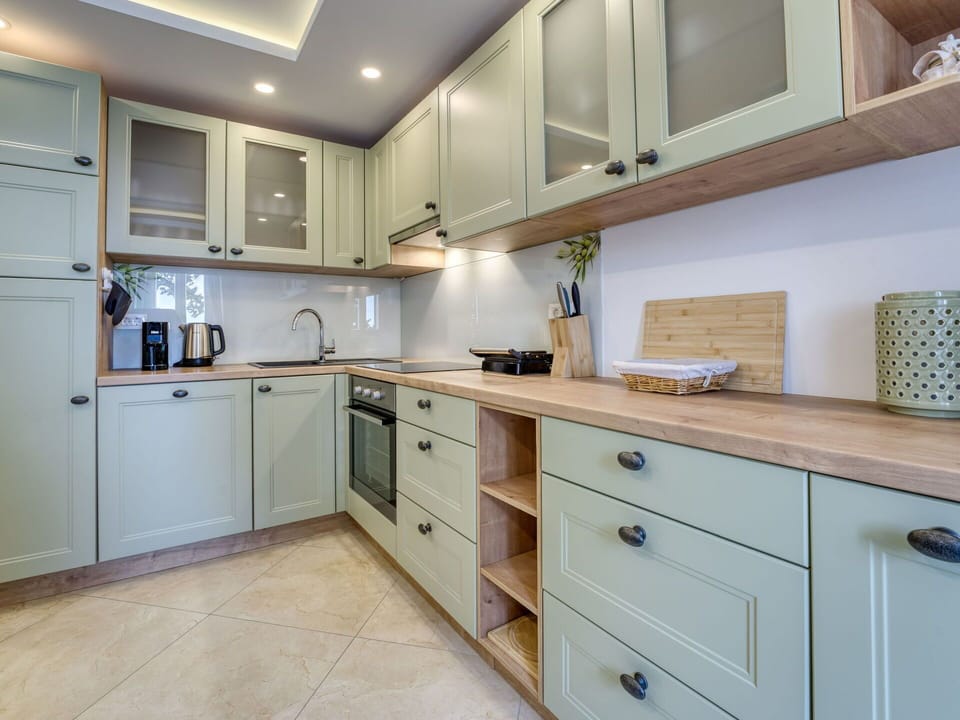 Cabinetry, Kitchen, Wood, Countertop, Kitchen Appliance, Drawer, Interior Design, Furniture, Major Appliance, Cupboard