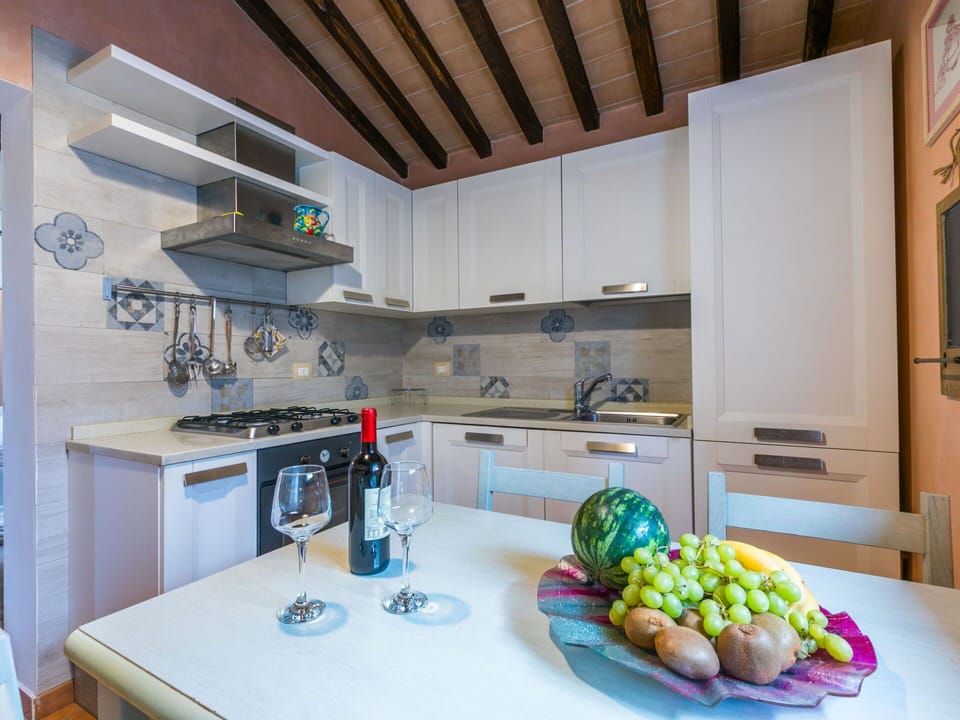 Kitchen, Interior Design, Countertop, Kitchen Appliance, Major Appliance, Wood, Flooring, Furniture, Home Appliance, Cabinetry