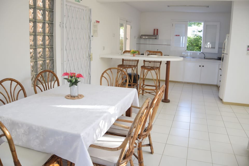 Bungalow, Ocean View | Living area | 120-cm TV with satellite channels