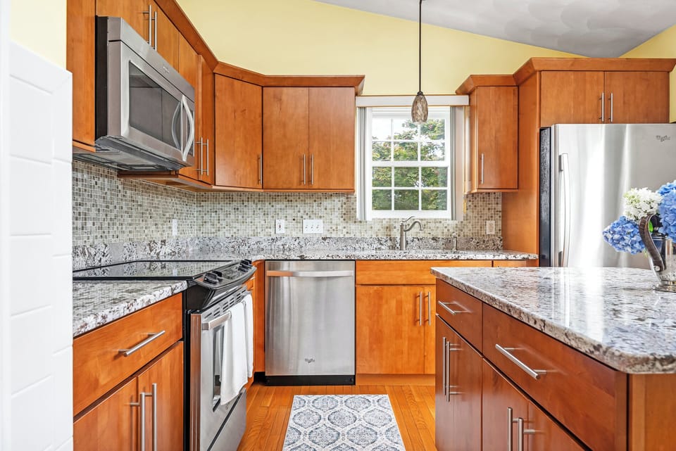 Full Kitchen with Solid Wood Cabinets and Stainless Appliances