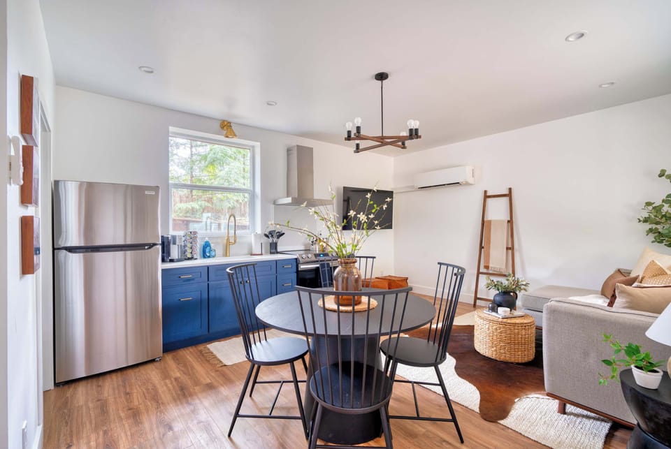 ADU kitchen, dining, and living, all open together.