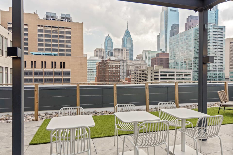 
Rooftop terrace with city views and outdoor seating