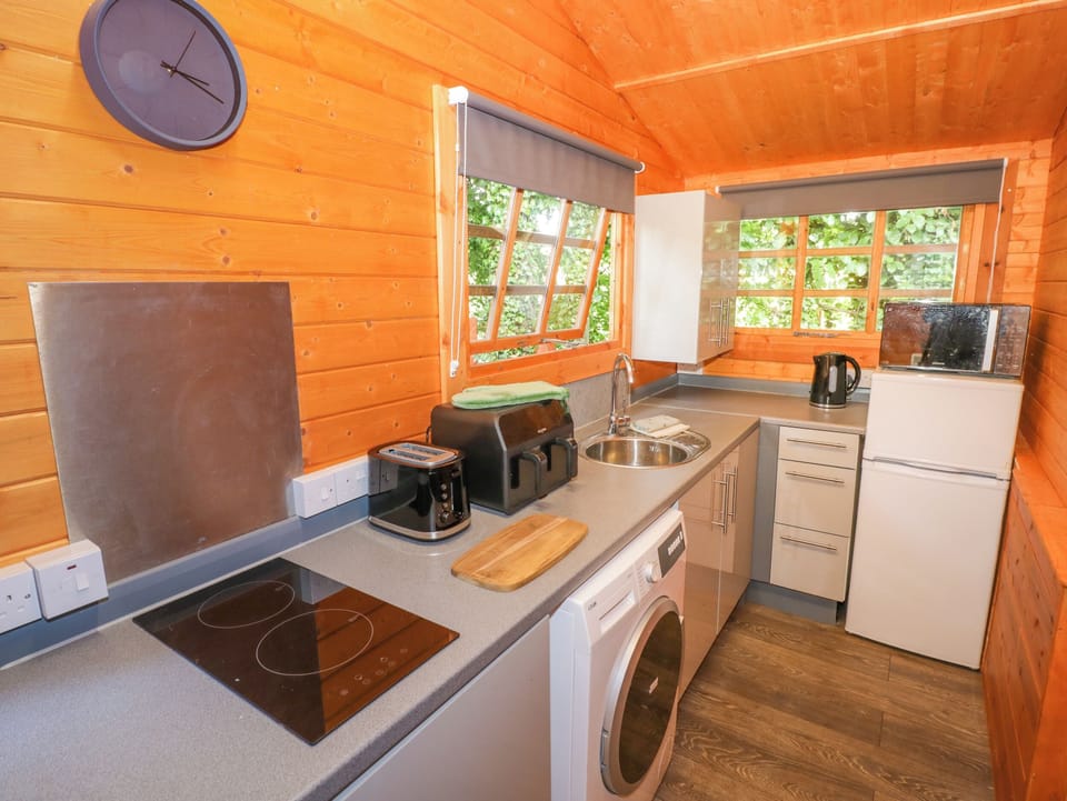Fridge, microwave, toaster, cookware/dishes/utensils