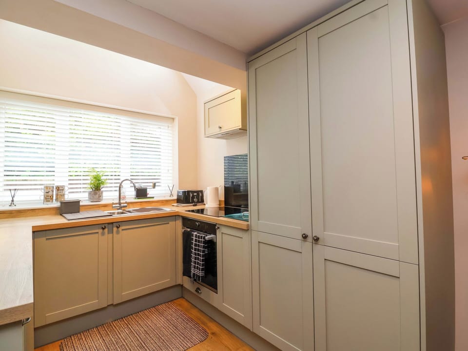 Fridge, microwave, toaster, cookware/dishes/utensils