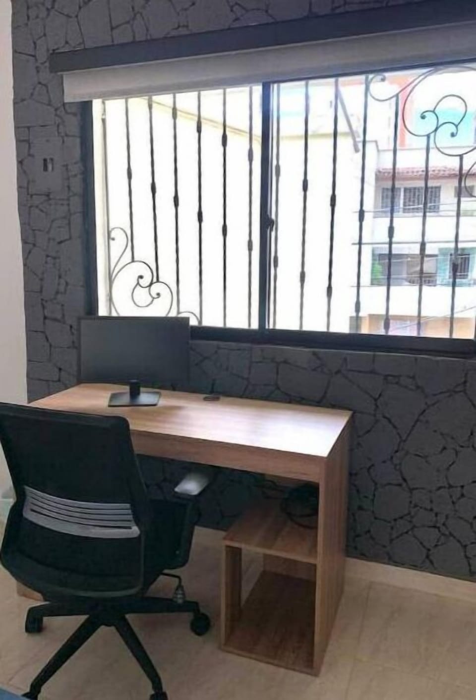 Desk with office chair and monitor