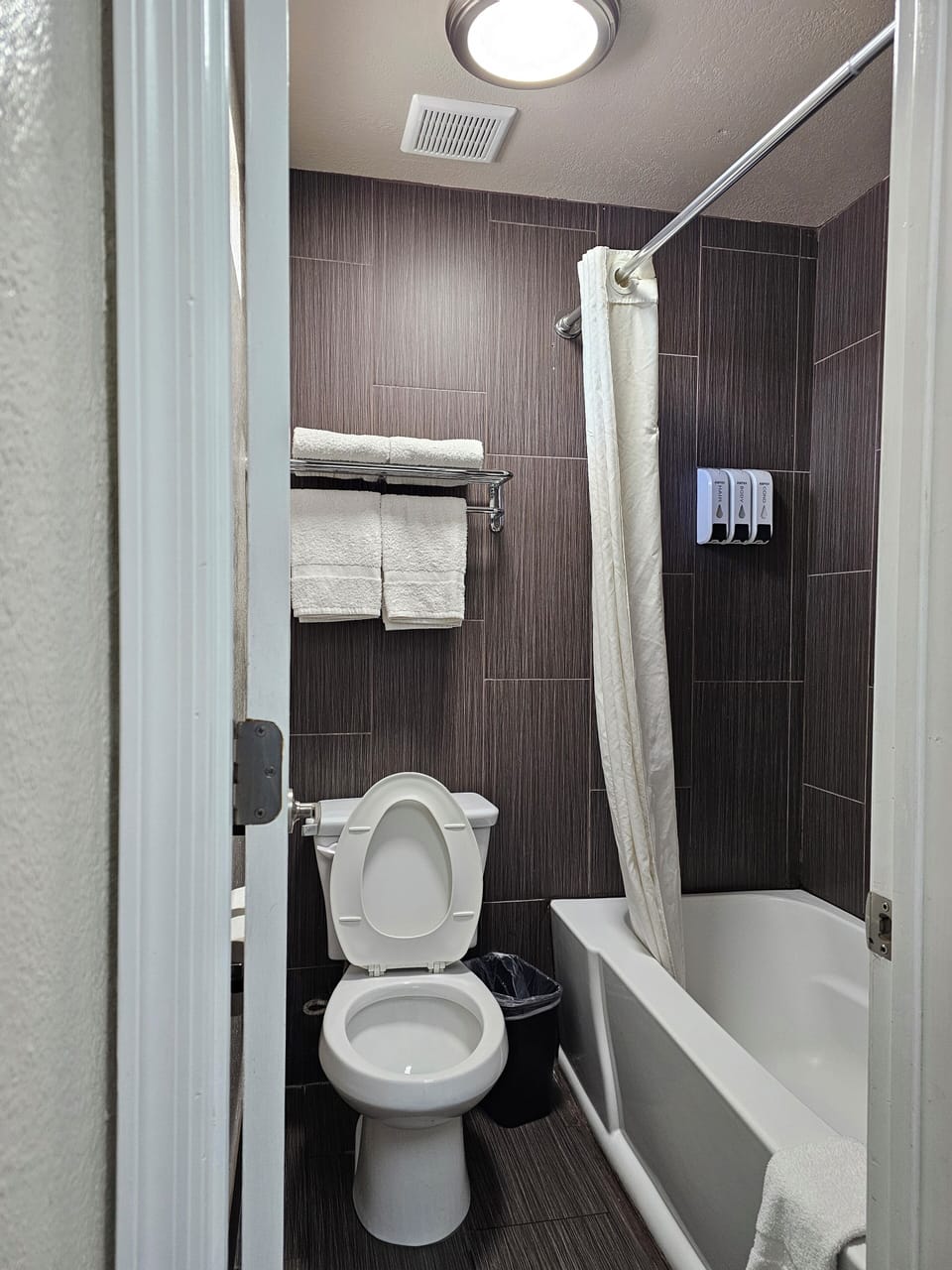 Standard Double Room, 2 Queen Beds, Non Smoking | Bathroom | Bathtub, towels, soap, shampoo