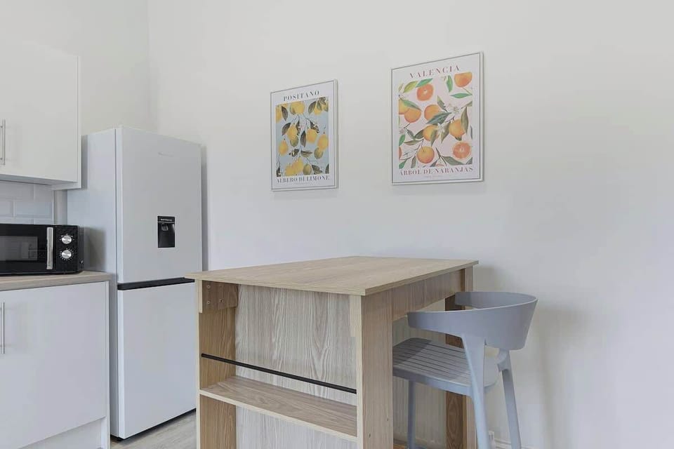 Family-friendly kitchen oasis equipped with all essentials, including a washer & dryer, oven, fridge and full cookware set.