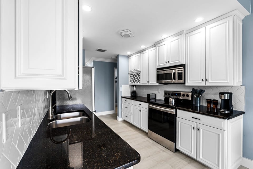The fully equipped galley kitchen has everything you need