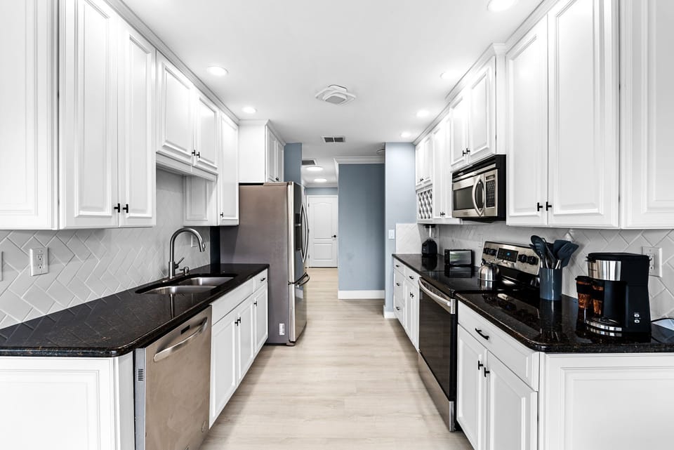 The fully equipped galley kitchen has everything you need