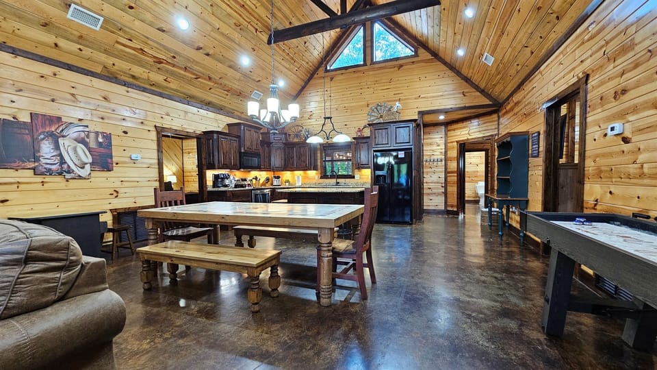 Dining Room: Gather around the rustic table under the charming beams for unforgettable meals!
