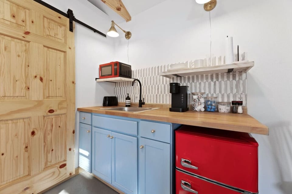 Mini kitchen with essentials and charm.