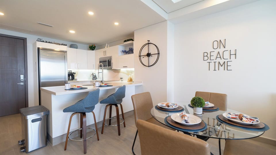 Additional seating at the kitchen counter.
