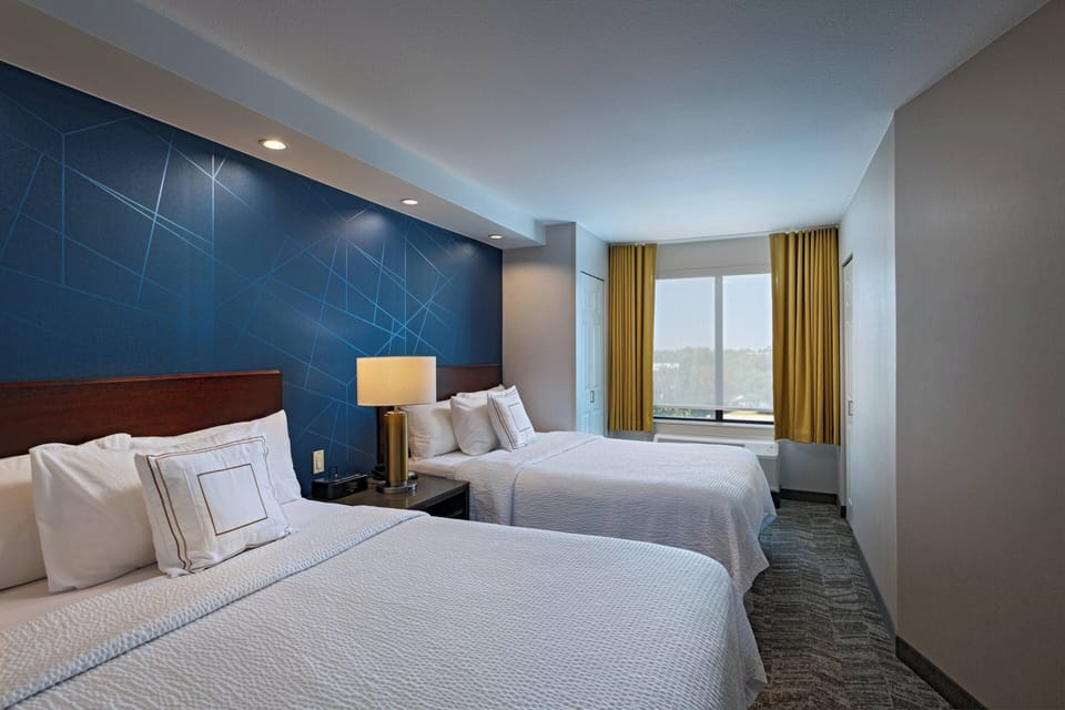 Suite, Multiple Beds | Premium bedding, in-room safe, desk, iron/ironing board