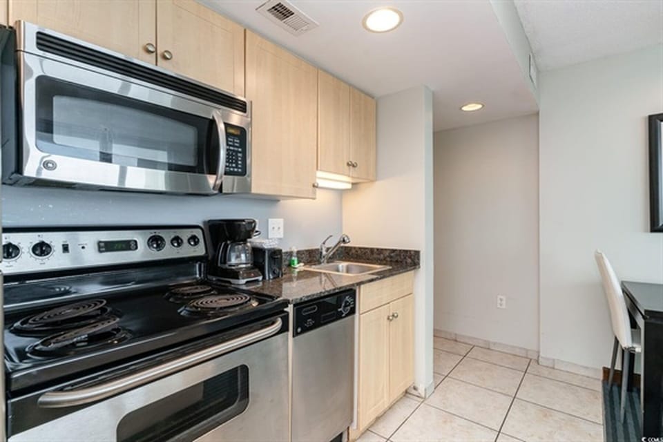 Kitchen with stainless steel appliances and granite countertops