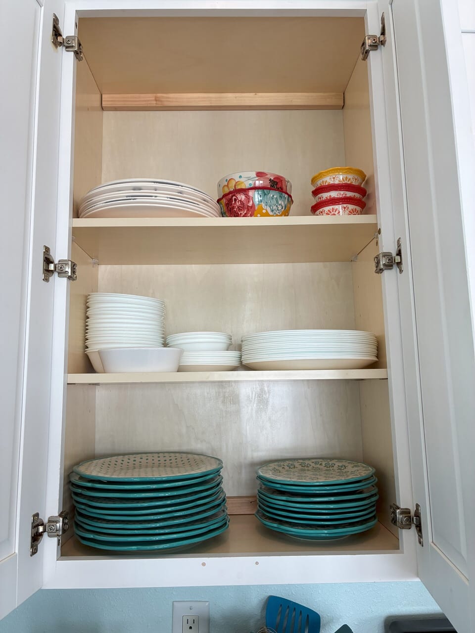 Fully stocked with dishes, bowls, and beautiful serving ware. 