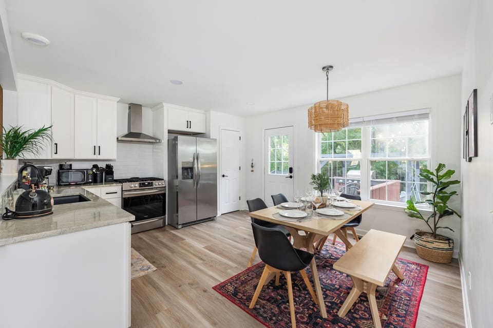 Enjoy the dining area with full dining place settings.