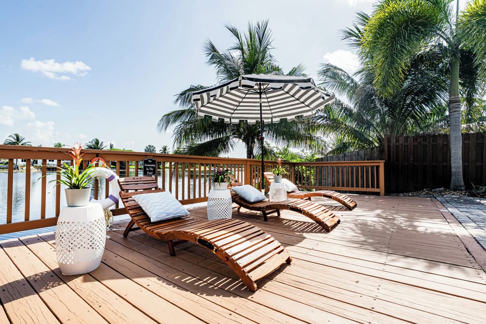 Sun loungers by the lake front pool