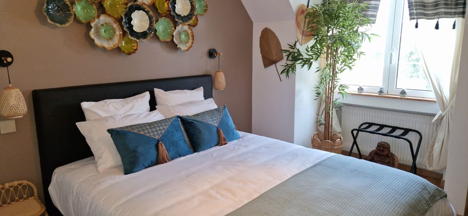 Premium bedding, Select Comfort beds, laptop workspace, blackout drapes