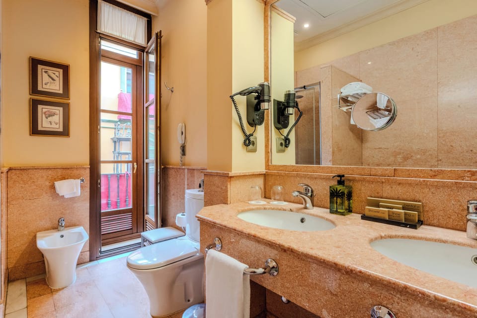 Separate tub and shower, free toiletries, hair dryer, towels