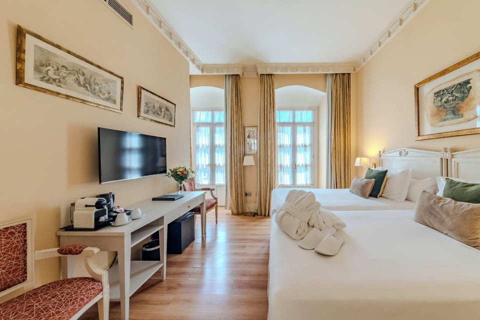 Premium bedding, down comforters, memory foam beds, minibar