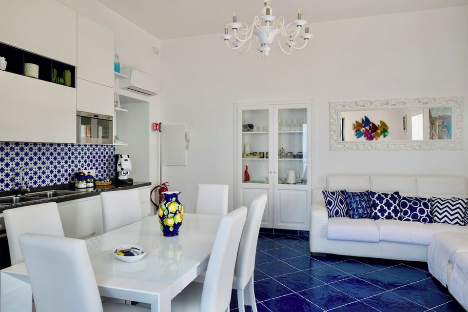 Apartment, 2 Bedrooms, Sea View | Living area | 32-inch flat-screen TV with digital channels