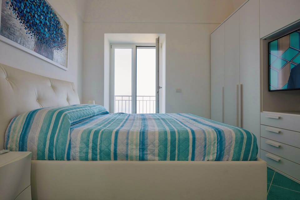 Apartment, 2 Bedrooms, Sea View | Iron/ironing board, free WiFi, bed sheets