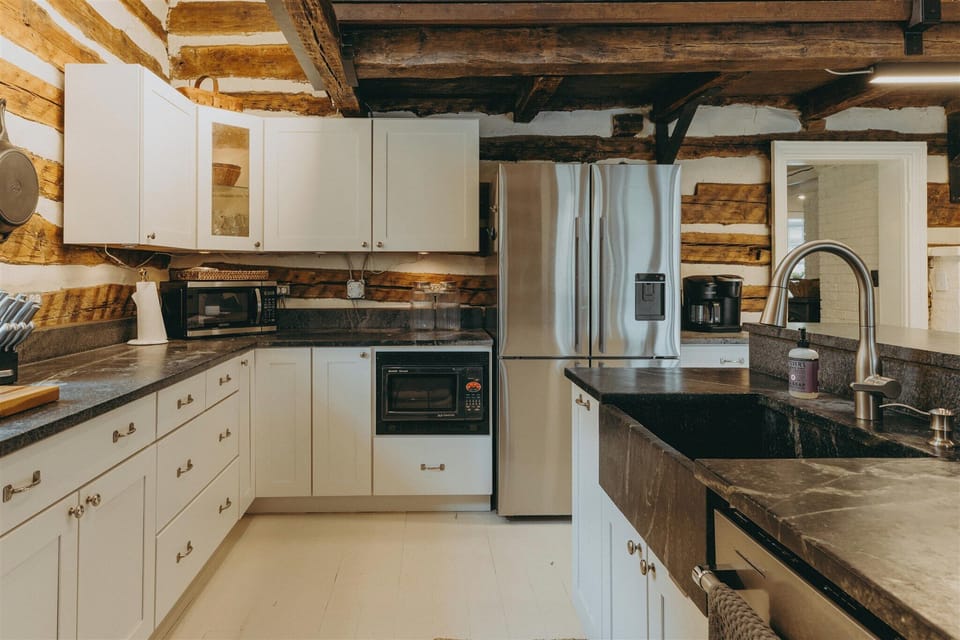 Modern cooking appliances and spacious countertops, the kitchen has it all!
