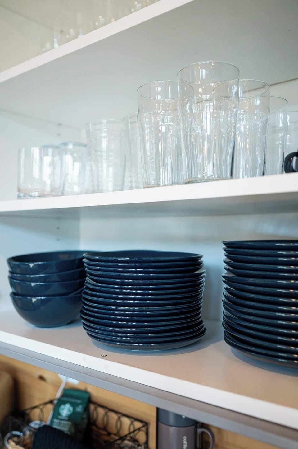 Well-stocked with dishes, glasses, and essentials—no need to pack the kitchen sink.