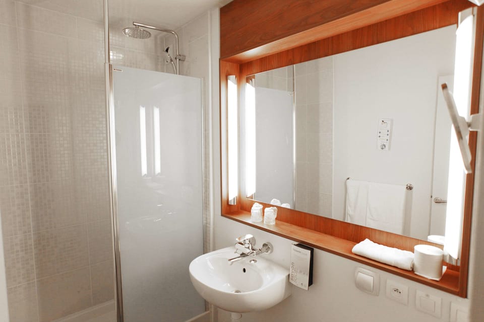 Standard Room, Multiple Beds | Bathroom | Eco-friendly toiletries, hair dryer, towels