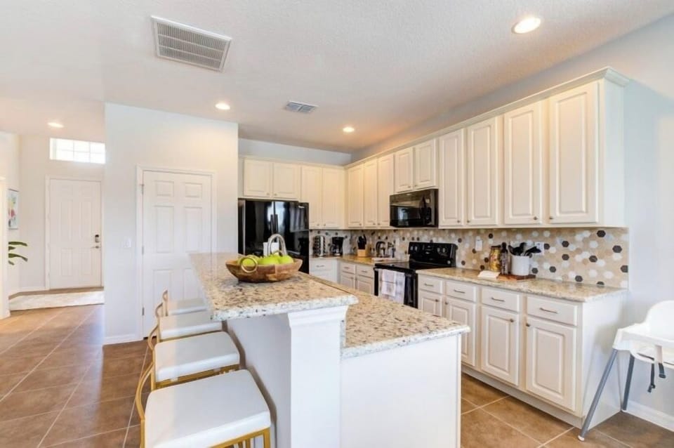 Fall in love for modern luxury with our stunning open kitchen—a beautiful, vibrant space that seamlessly combines style and functionality. a family-friendly retreat where the joy of cooking meets the warmth of togetherness.