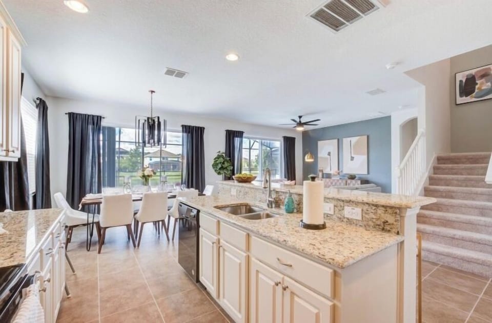 Fall in love for modern luxury with our stunning open kitchen—a beautiful, vibrant space that seamlessly combines style and functionality. a family-friendly retreat where the joy of cooking meets the warmth of togetherness.