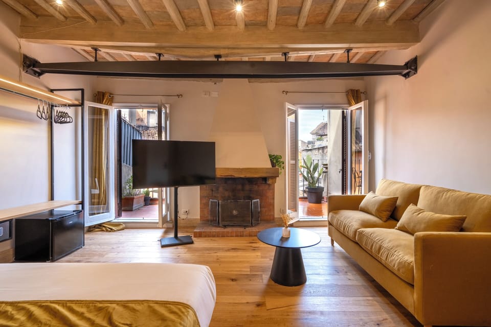 Junior Quadruple Room, City View | In-room safe, desk, iron/ironing board, free WiFi