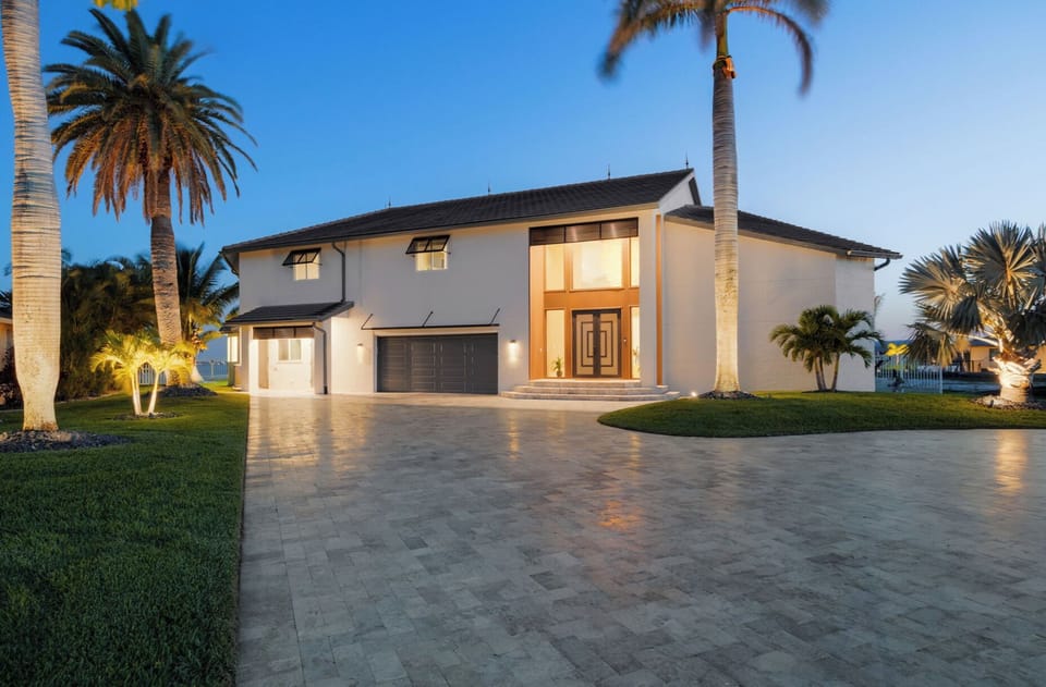 Exterior Paradise: Stunning architecture illuminated by palm trees