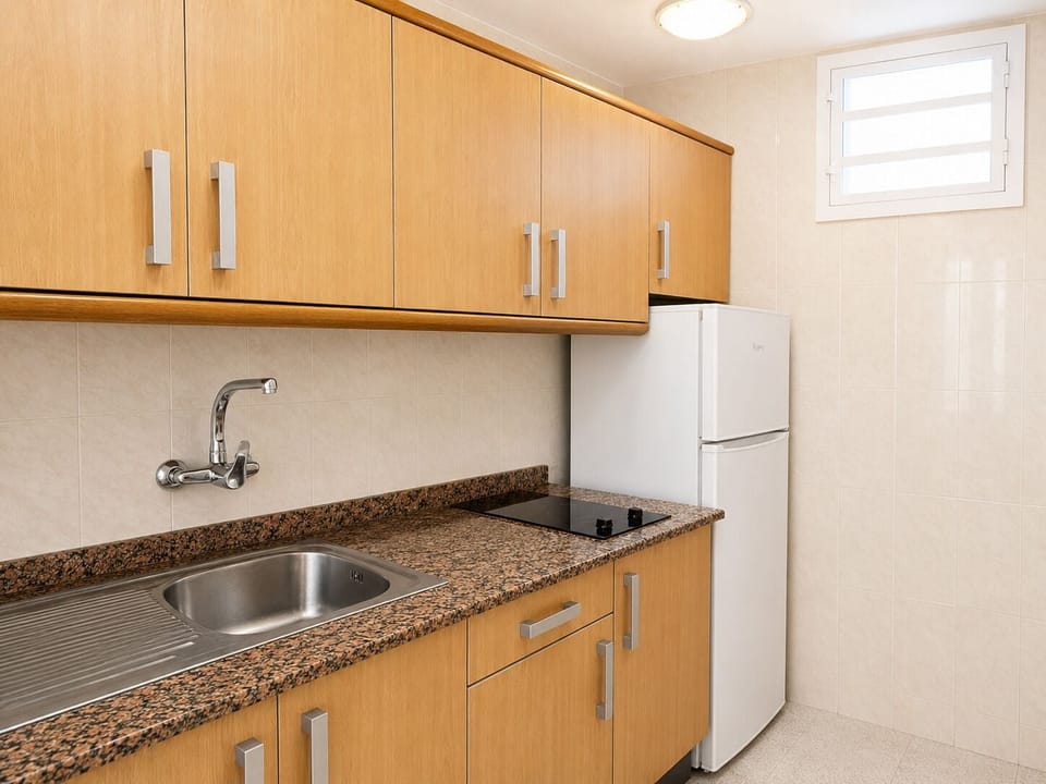 Mini-fridge, microwave, stovetop, cookware/dishes/utensils