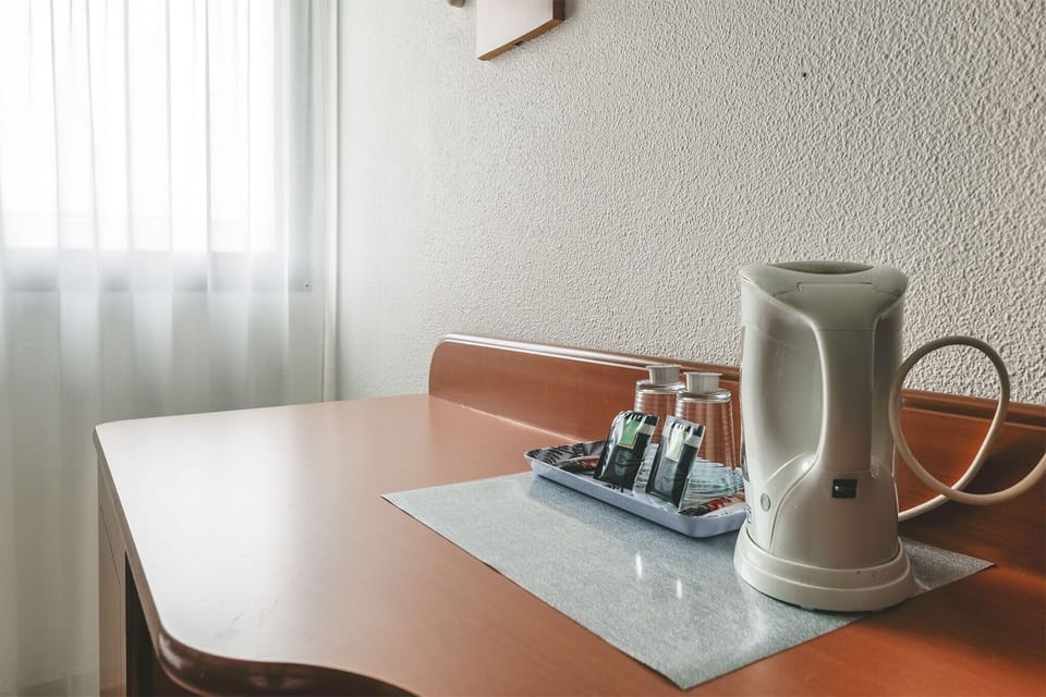 Classic Quadruple Room | Premium bedding, desk, laptop workspace, free WiFi