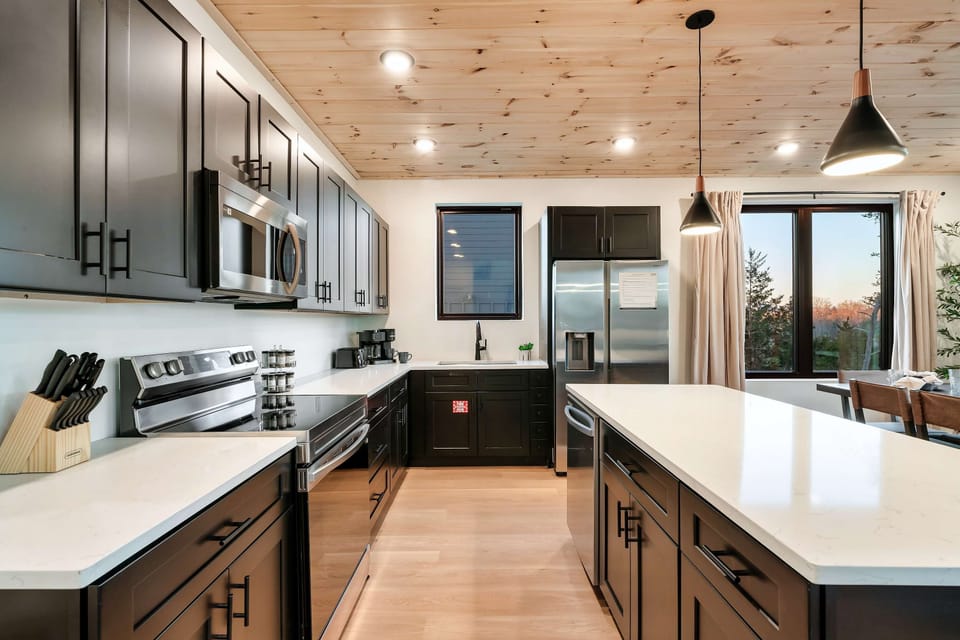 Cook up culinary delights in this modern space with stunning mountain views!