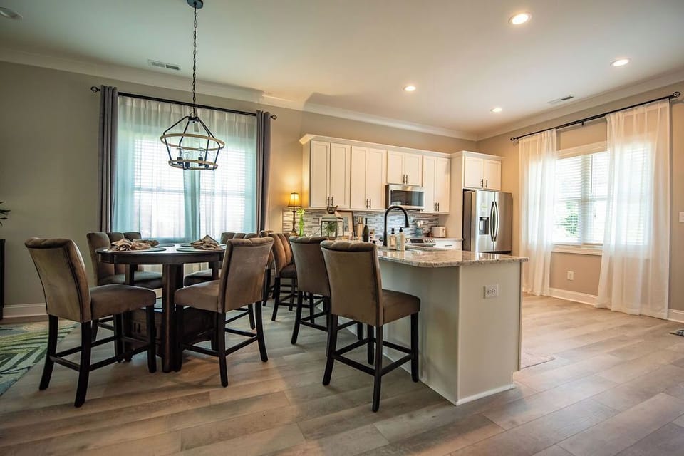 dining table and breakfast bar ensure seating or all your friends and family in a comfortable, yet casual setting. 