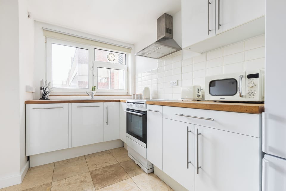 Apartment | Private kitchen | Full-size fridge, microwave, oven, stovetop