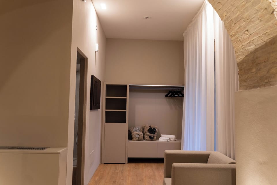 Deluxe Triple Room | In-room safe, desk, laptop workspace, blackout drapes
