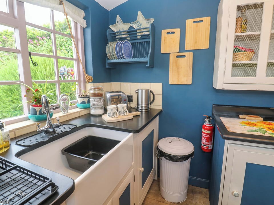 Fridge, microwave, cookware/dishes/utensils